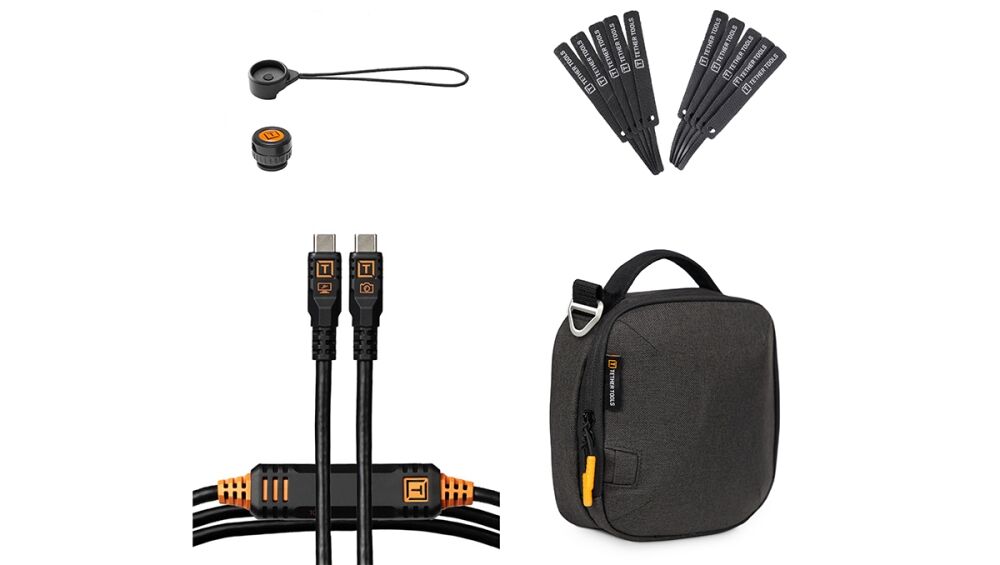 Assorted photo‑gear accessories: zip ties, USB‑C cables, a lens cap tether, and a compact carrying case.