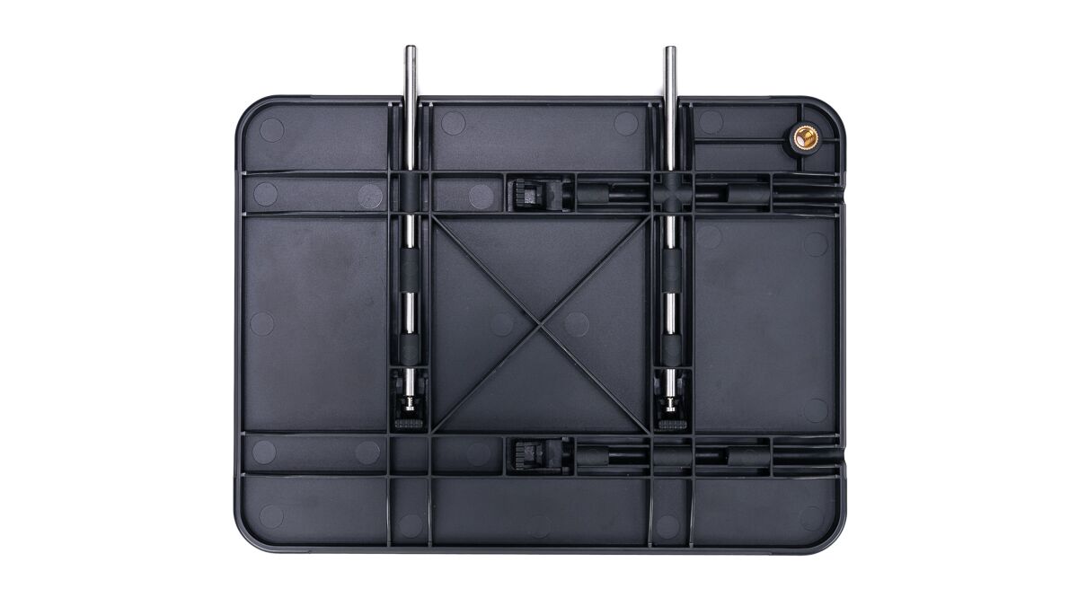 Bottom view of a black plastic device base with metal support rods and screw mounts