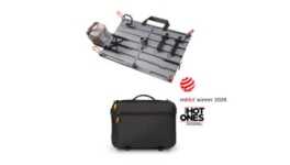 Modular camera rig on a wheeled cart above a black camera bag; Red Dot 2026 and HOT ONES award logos nearby.