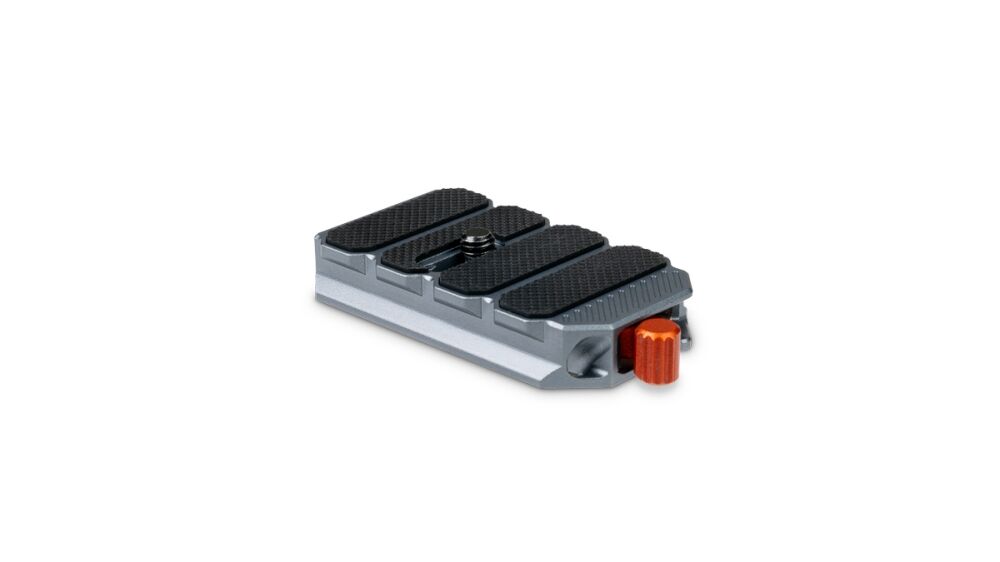 Four-segment expression pedal with black rubber foot pads and an orange side knob on the right side.