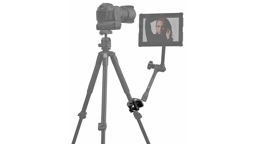 Rock Solid Master Clamp connected to a tripod